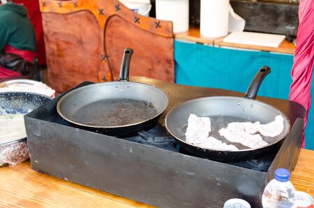 preparation of food on the street, in the marketの写真素材