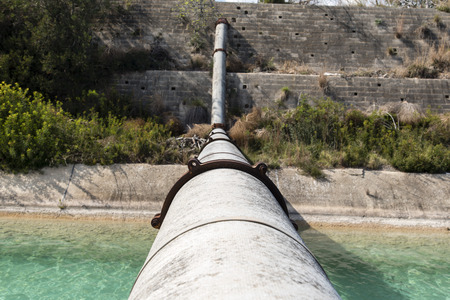 Pipes above the water channel in the Spainの写真素材