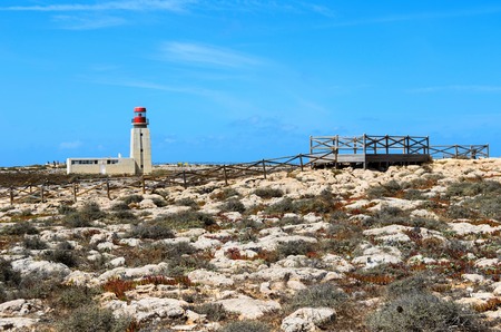 View of Cabo Sao Vicente lighthouse, Sagres, Algarve region, Portugalの写真素材