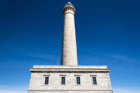 Lighthouse on a sunny day with blue skyの写真素材