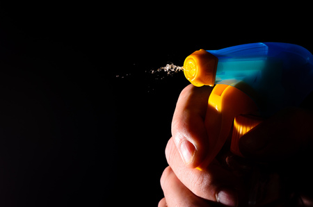 Water splashes over black background