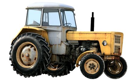 Yellow tractor isolated on white backgroundの写真素材