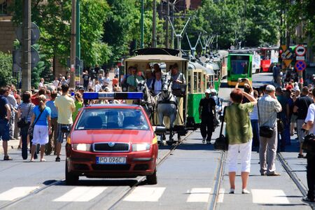 POZNAN, POLAND - JUNE 26, 2010 celebration of the 130th anniversary of MPK Poznan sp. z o.o. combined with a solemn parade of the vehicles. Both buses and tramways were put in ordered cue from the oldest to the newest starting from the horse tramway (1880のeditorial素材