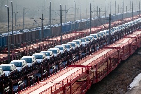 Freight trains with different cargo on the stationの写真素材