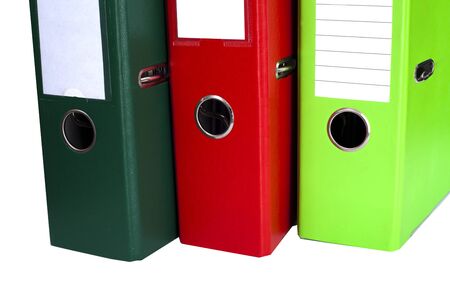 Colorful office folders binders isolated on whiteの写真素材
