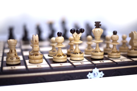 Chess board with figures during chess playの写真素材