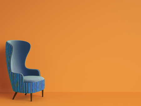 Classic armchair in blue color on orange background with copy space.Minimal concept. Digital illustration. 3d renderingの写真素材