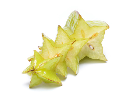 Unripped star fruit - carambola isolated on white backgroundの写真素材