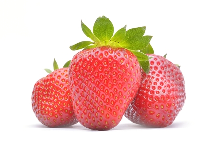 Fresh ripe strawberries isolated on whiteの写真素材
