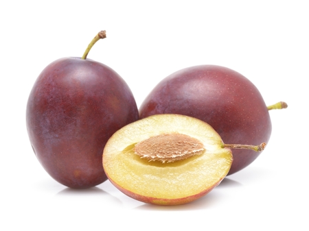plums isolated on whiteの写真素材