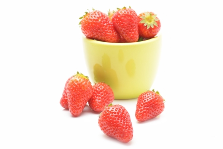 bowl with strawberries isolated on white backgroundの写真素材