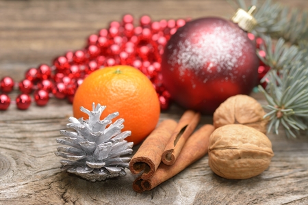 Christmas background with rustic Christmas decorations on wooden tableの写真素材