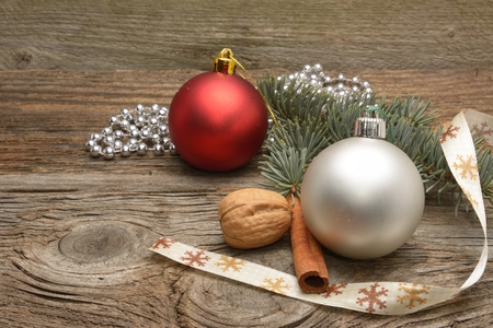 Christmas background with rustic Christmas decorations on wooden tableの写真素材