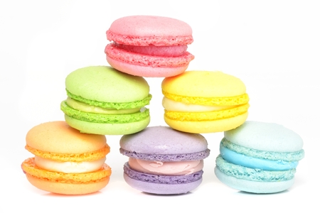 Sweet and colourful french macaroons or macaron on white backgroundの写真素材