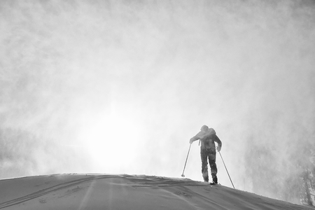 Ski touring in harsh winter conditionsの写真素材