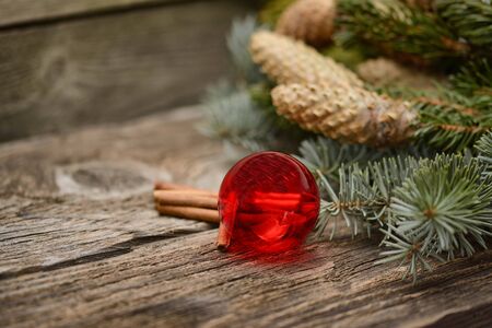 Christmas background - baubles and branch of spruce treeの写真素材