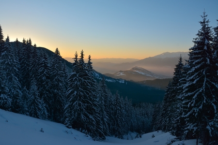 Bright sundown on mountainの写真素材