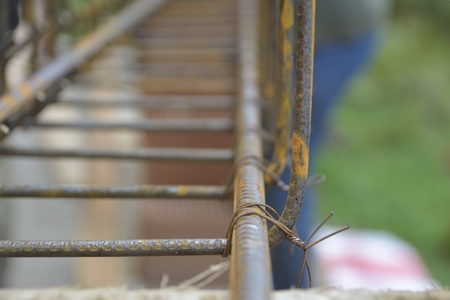 securing steel bars with wire rod for reinforcement of concrete or cement