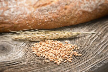 Baked bread on wooden tableの写真素材