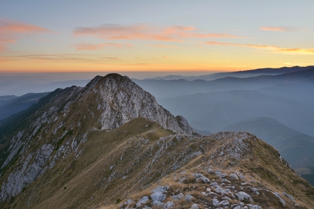 sunrise and narrow ridges in the Piatra Craiului mountainsの写真素材