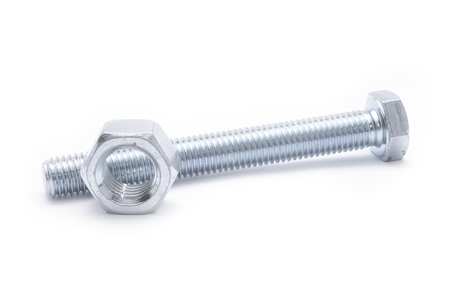 Steel bolt and screw nut isolated on white backgroundの写真素材