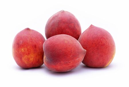 fresh peaches on white backgroundの写真素材