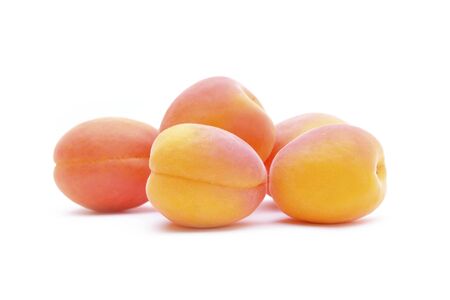 ripe apricot isolated on white backgroundの写真素材