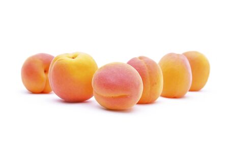 ripe apricot isolated on white backgroundの写真素材
