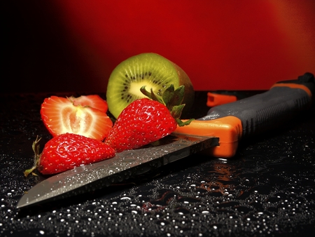 fruits, knife on woodの写真素材