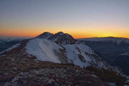 majestic sunset in the winter mountains landscapeの写真素材