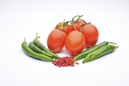 red pepper and tomato on white backgroundの写真素材