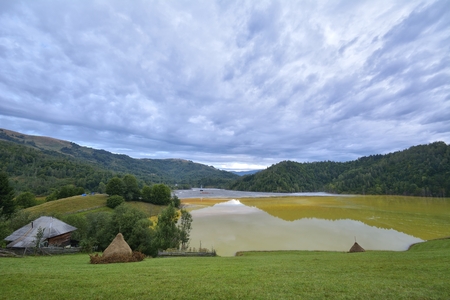 Beautiful landscape with polluted lake by copper miningの写真素材