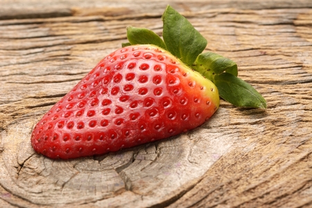 fresh strawberries on the brown wooden tableの写真素材