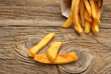 French fries on wooden tableの写真素材