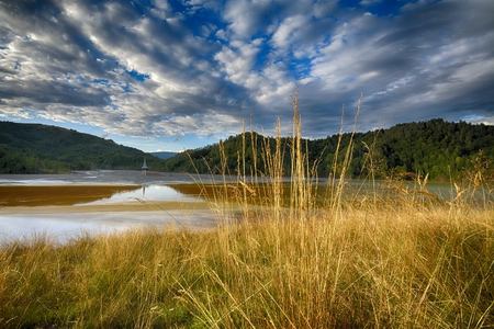 Pollution of a lake with contaminated water from a gold mineの写真素材