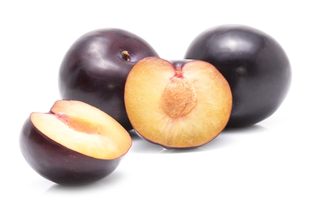 fresh plums on a white backgroundの写真素材