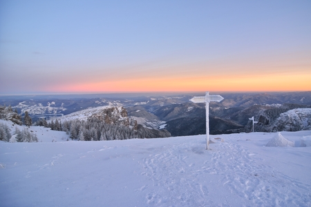 Sunrise above the mountain peaks, view from Ceahlau mountains, Romania.の写真素材