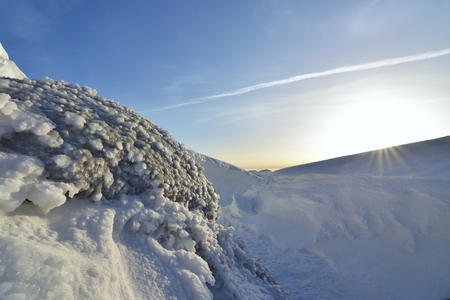 Ice with the sun. Winter landscape.の写真素材
