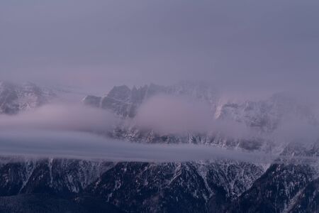 View of Acele Morarului (Bucegi Mountains) in a foggy morningの写真素材