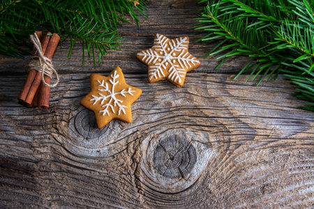 Christmas homemade gingerbread cookies over wooden tableの写真素材