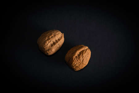Walnuts isolated on black backgroundの写真素材