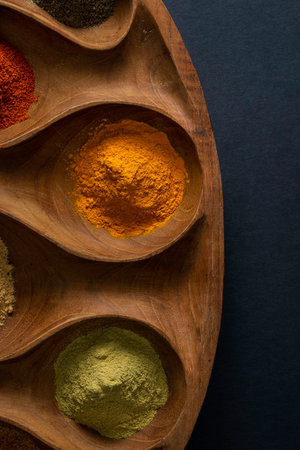 Various spices on wooden background.の写真素材