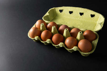 Fresh eggs on black backgroundの写真素材