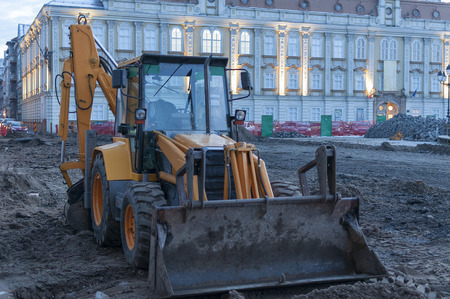 Excavator on construction site in the city. Union square