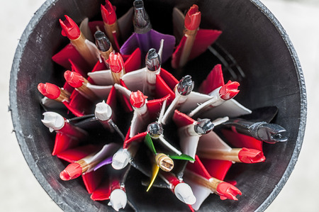 Closeup on a bunch of arrows stored in a tube.の写真素材