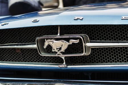 TIMISOARA ROMANIA - APRIL 22 2017: Old Ford Mustang displayed on a retro car parade. Front view close-up.のeditorial素材