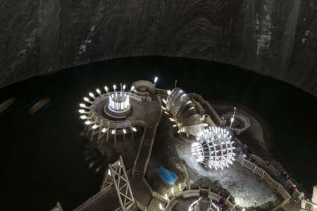 Inside a salt mine. Inner view. Neon lights. Real People. Long Exposure.の写真素材
