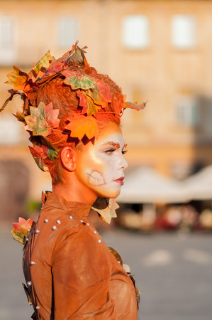 TIMISOARA, ROMANIA - September 08, 2017: Portrait of a woman in brown dress at the CheckArt Carnival. Living statue. Union Square.のeditorial素材