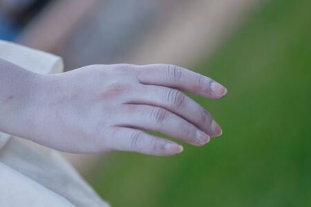 TIMISOARA, ROMANIA - September 08, 2017: detail of a woman's hands at the CheckArt Carnival. Living statue. Union Square.のeditorial素材