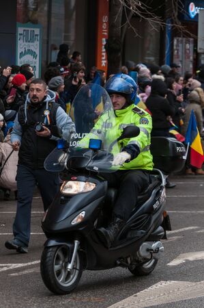 TIMISOARA, ROMANIA - DECEMBER 1, 2017: National Day parade in Romania. Local police.のeditorial素材